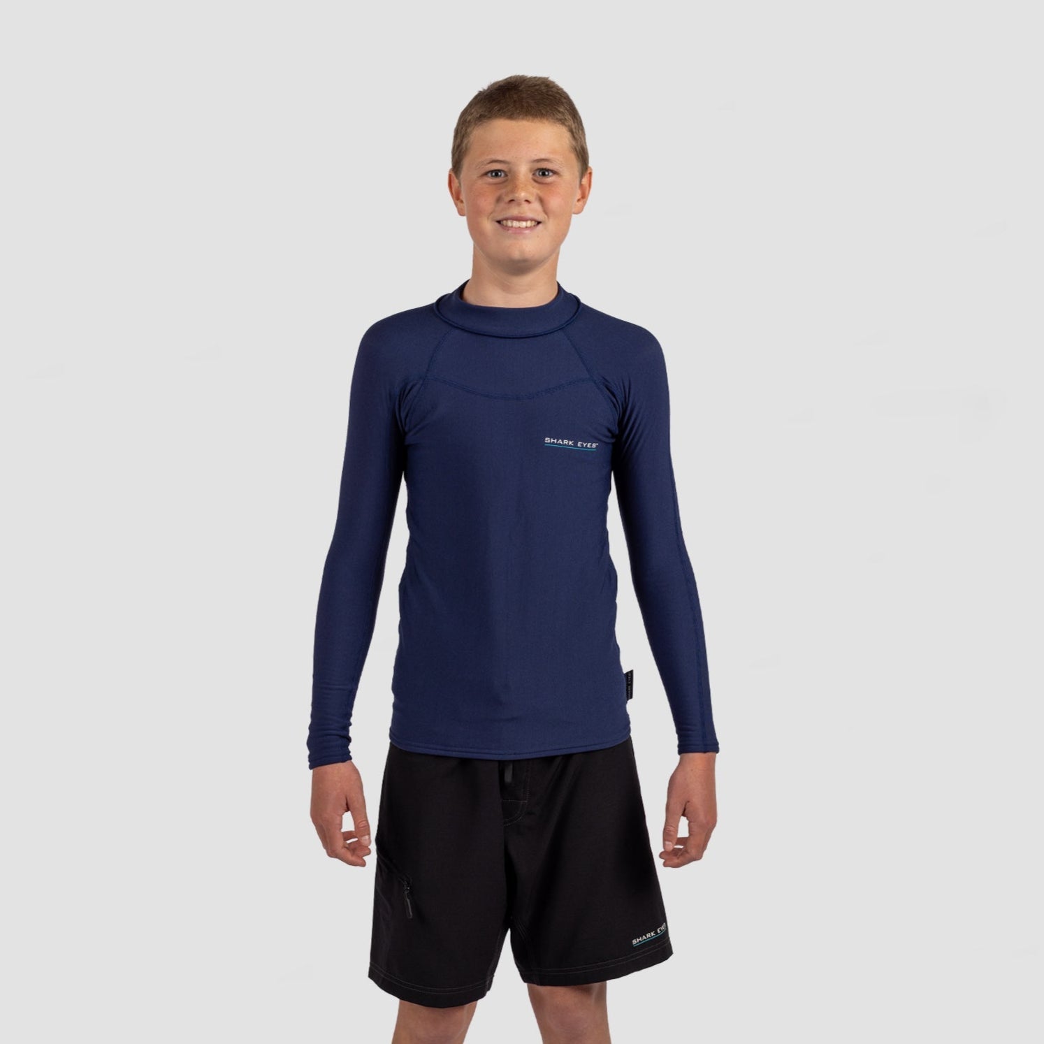 Shark Eyes youth 1.5mm thermal rash vest, navy — thermal warmth for young surfers, surfing