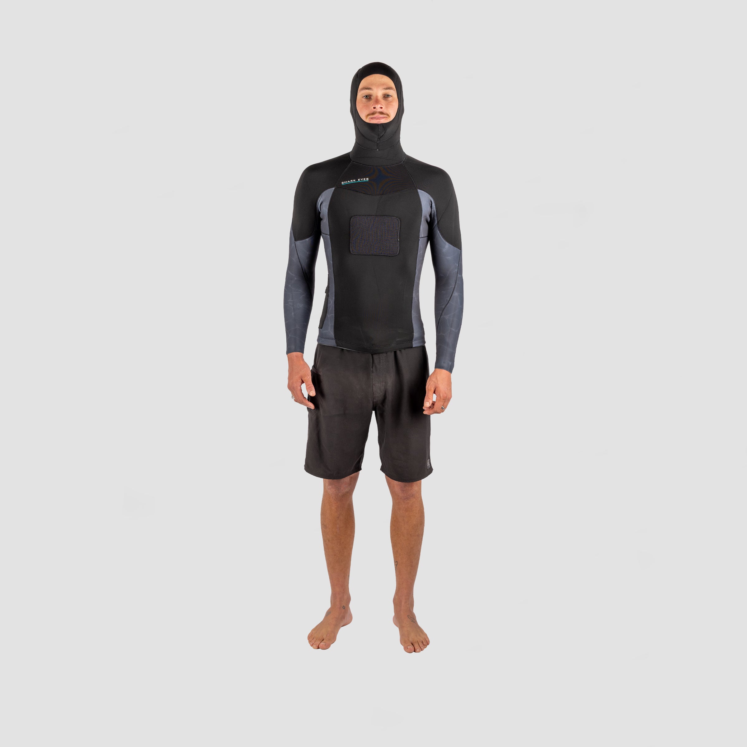 Person wearing a 2.5mm hybrid wetsuit jacket