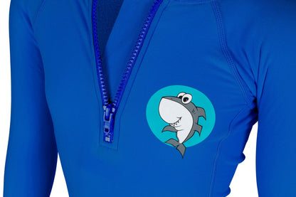 Side view — groms in Shark Eyes thermal rash vest in cold water — surfing