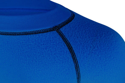 Shark Eyes groms thermal rash vest in use — cold water surfing rashie