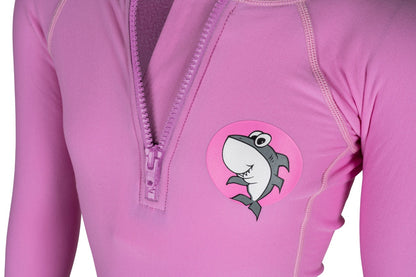 Side view — groms in Shark Eyes thermal rash vest in cold water — surfing