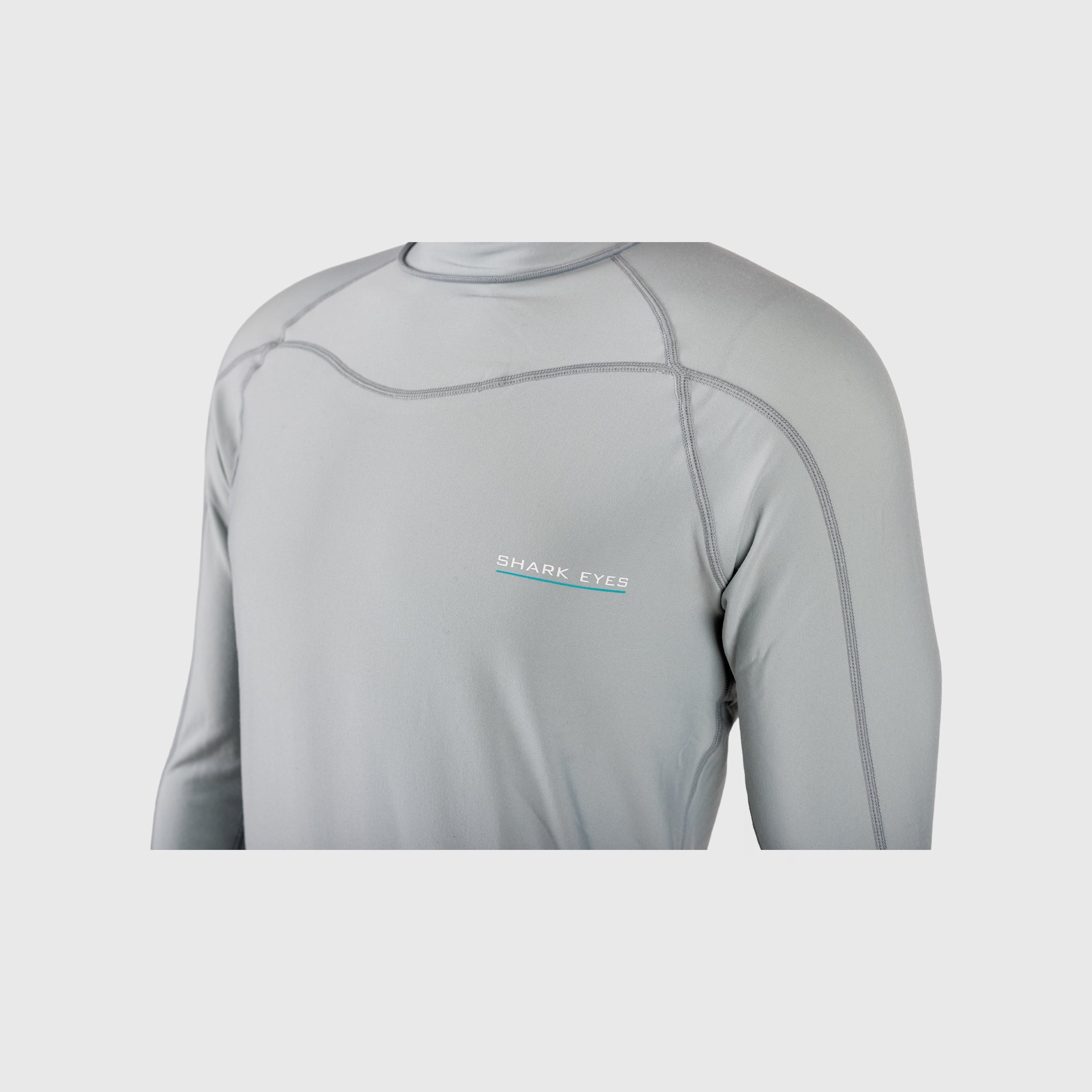 Close-up of thermal rash vest detail on Shark Eyes mens — quality rashie construction