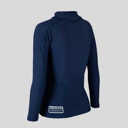 Shark Eyes thermal rash vest on womens in the ocean — cold water surf rashie