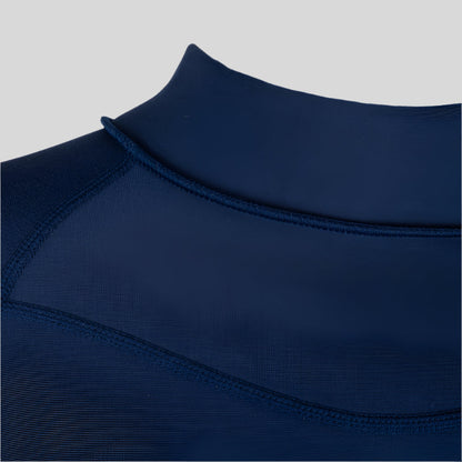 Shark Eyes womens thermal rash vest in use — cold water surfing rashie