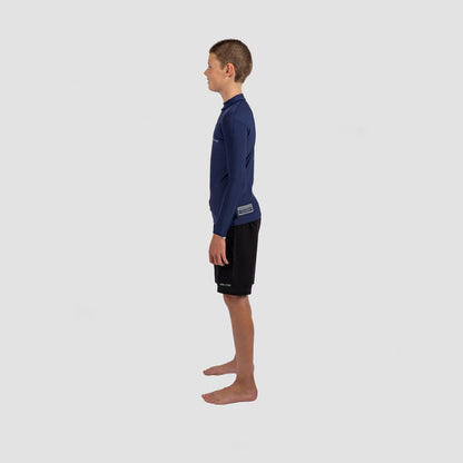 Shark Eyes thermal rash vest on youth in the ocean — cold water surf rashie